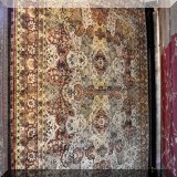 R16. Handcrafted rug. 8' x 9'9”